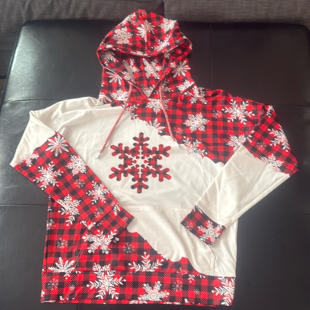 Red, white, and black snowflake hooded sweatshirt Size medium